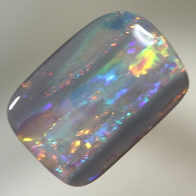 SOLID SEMI BLACK OPAL Fire display showing bands of colour 